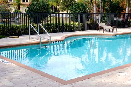 Non-Slip Pool Deck Cleaning in Fairhope, AL: Remove Slick Algae Before Summer